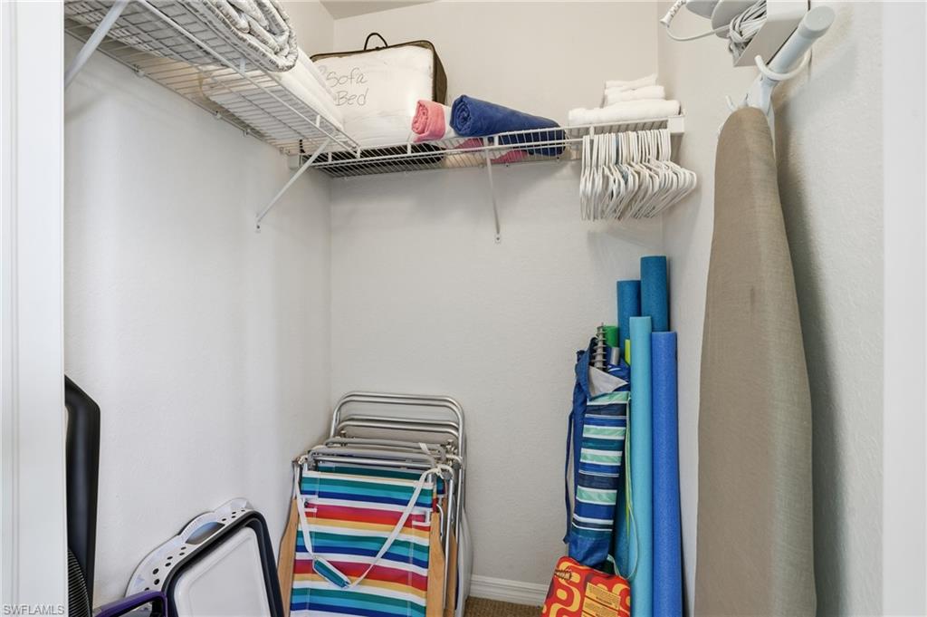 LARGE CLOSET FOR STORING BEACH AND GOLF ITEMS..