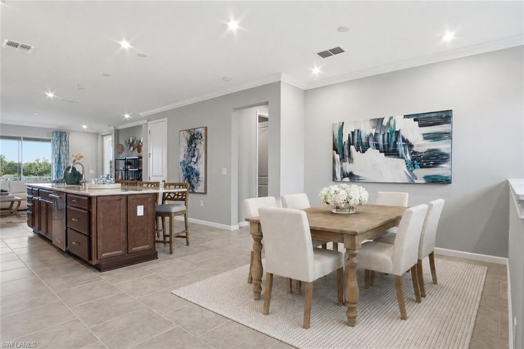Photo includes reality staging to showcase the possibility of the dining room. Design services included with purchase!