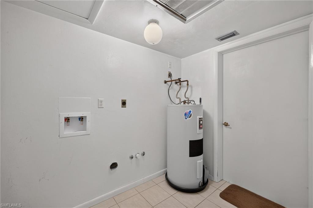 Laundry Room with Washer/Dryer Hook-Up and Hot Water Heater
