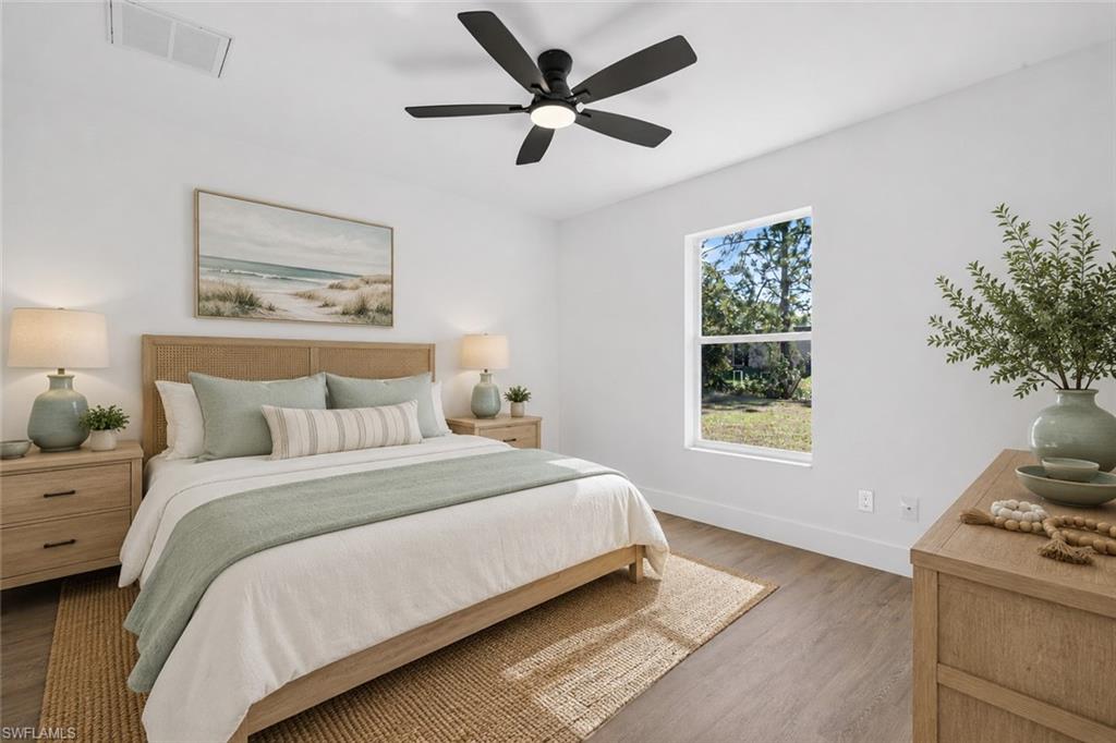 Primary Bedroom with Vaulted Ceilings and new Modern Fan