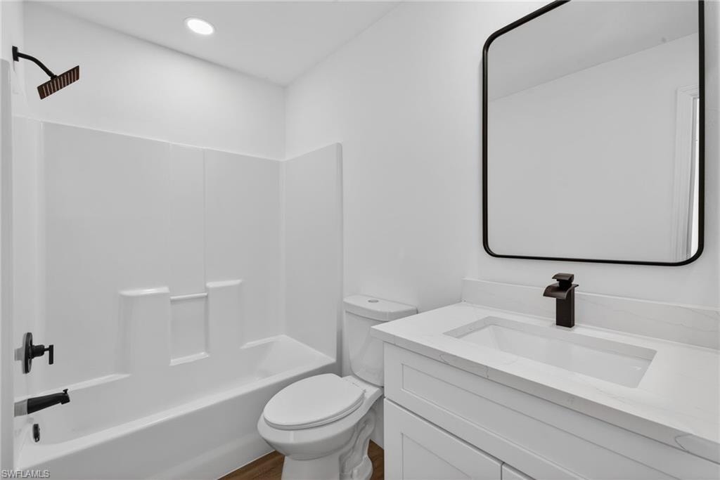 Primary Bathroom with Shaker Vanity, Quartz, Maintenance Free Shower