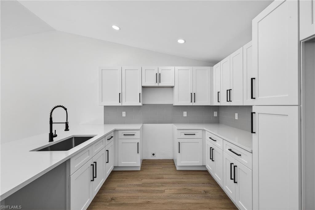 White Shaker Soft Close Cabinets with Black Hardware