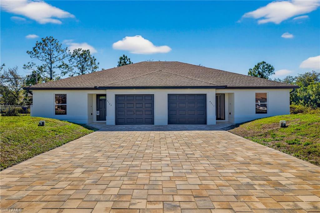 Brand New Paver Driveway, Upgraded Garage Doors