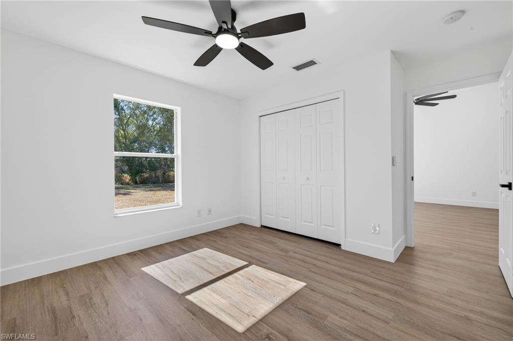 Primary Bedroom with New Vinyl Plank Floors