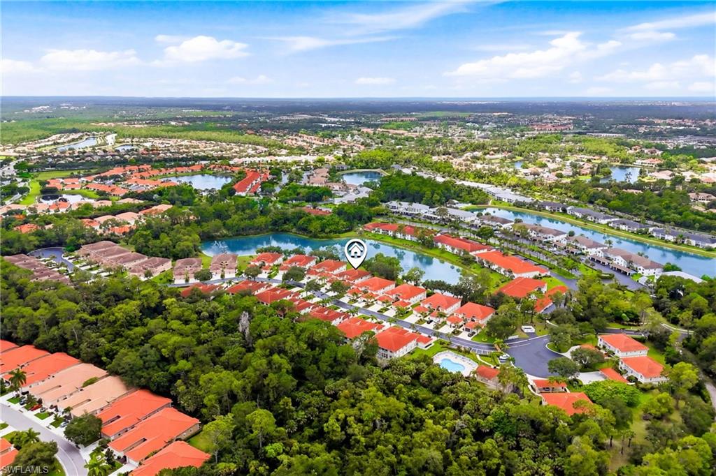 Bird's-eye view showcases the beautiful setting of this residence within the highly desirable Sapphire Lakes community.