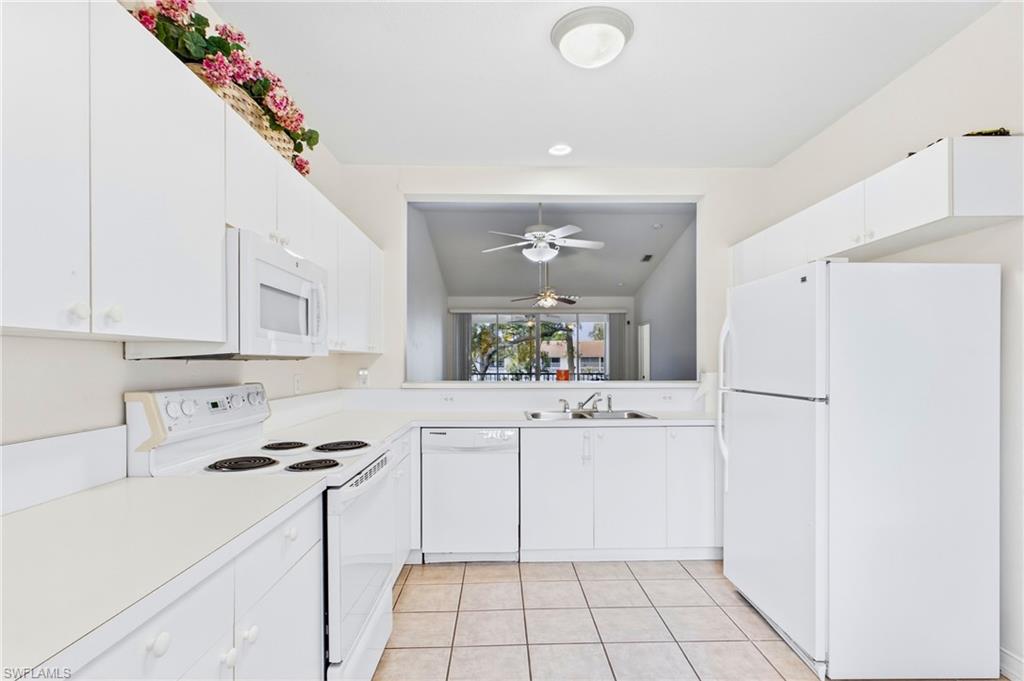 Bright and functional kitchen serves as the heart of the home.
