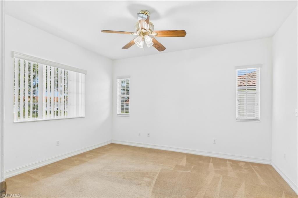 The oversized primary bedroom easily accommodates large furnishings while maintaining an open and airy feel.