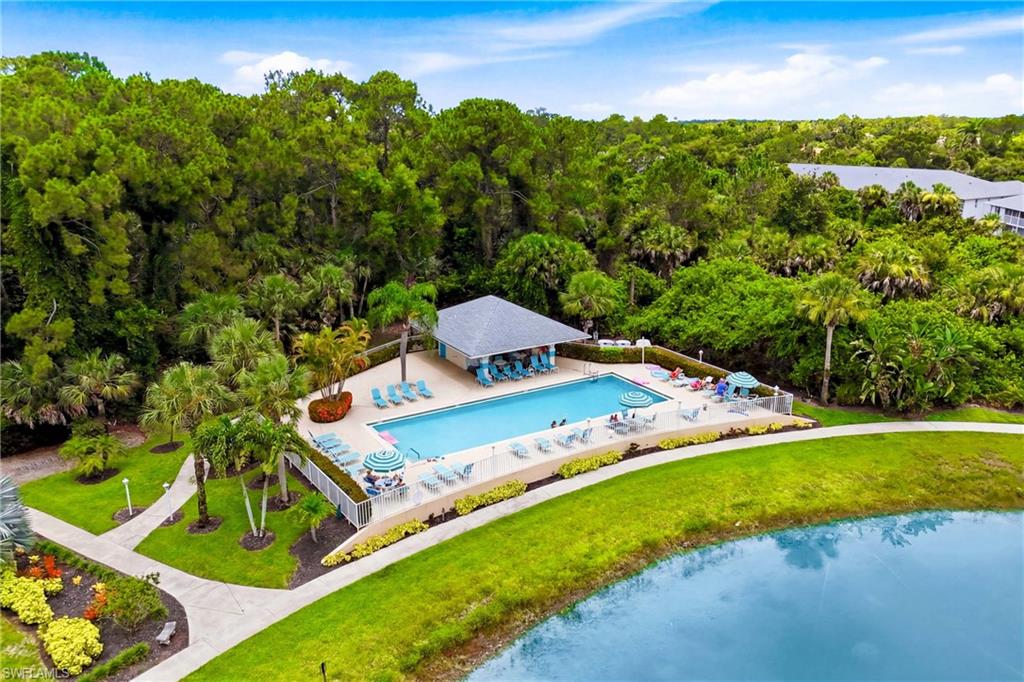 Enjoy multiple resort-style amenities with this aerial view highlighting an additional community swimming pool just moments from your home.