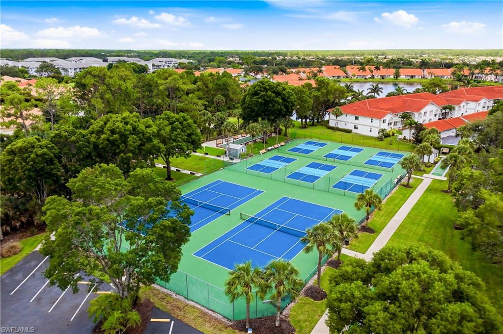 Take in the exceptional lifestyle amenities from above, featuring well-maintained pickleball, tennis, and shuffleboard courts.
