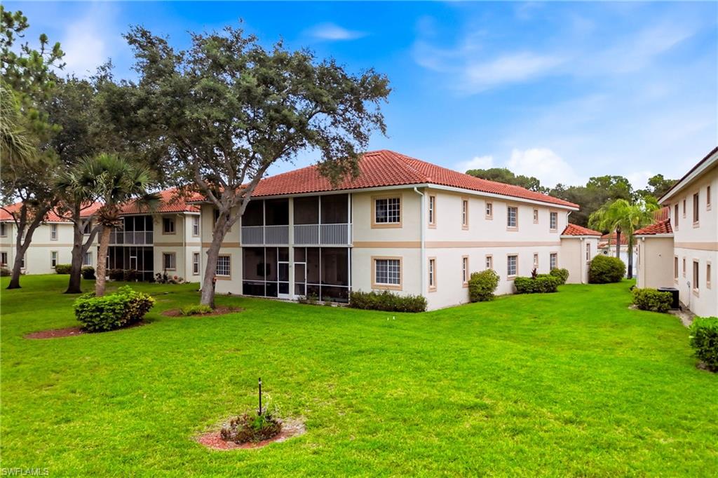 Covered lanai at the back of the home overlooks tranquil water views, ideal for enjoying Florida sunsets.
