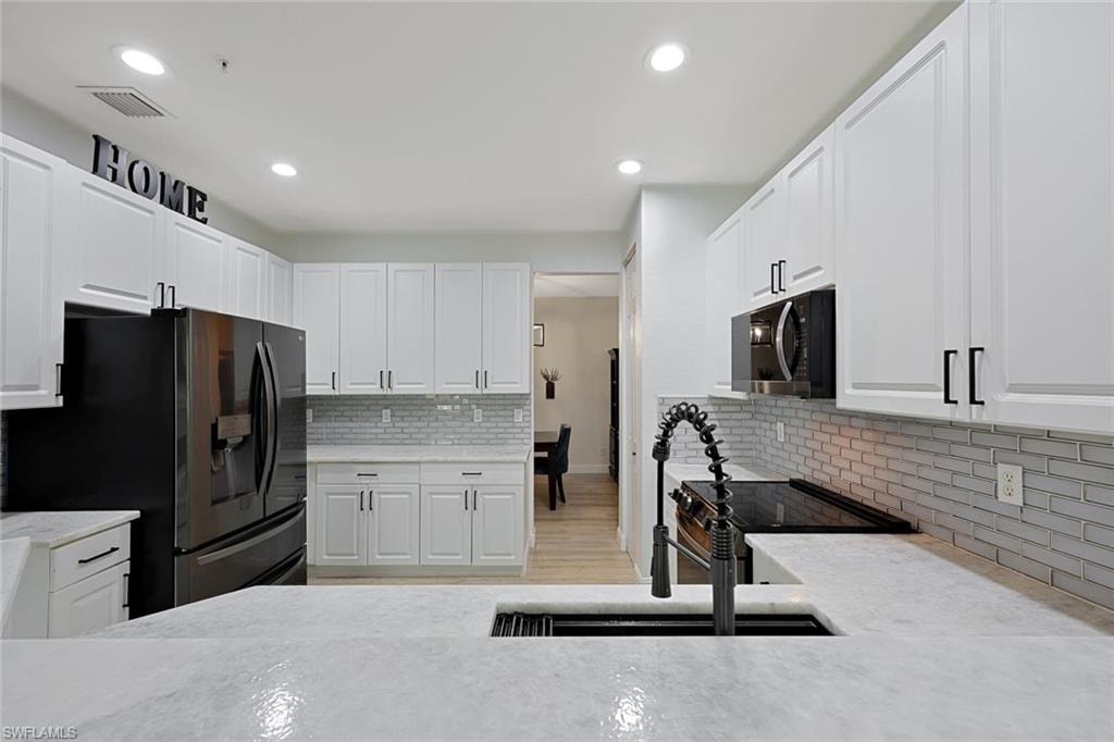 Cristallo Granite Counters and Tile Backsplash
