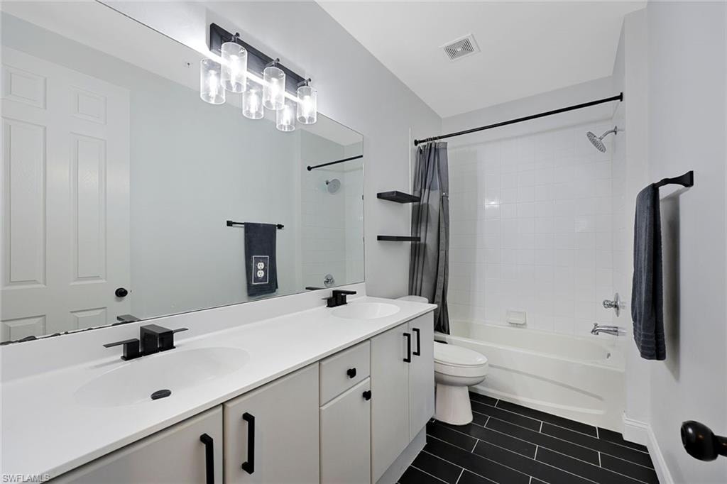 Secondary Bathroom with Tile Floors