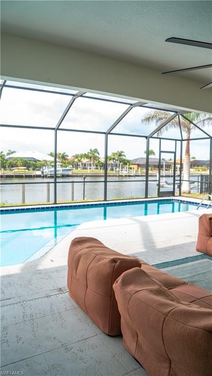Screened lanai featuring a swimming pool and water frontage