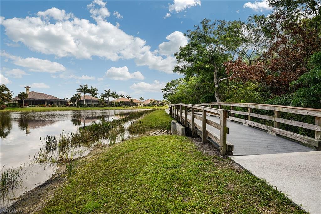 A boardwalk crosses wetland preserve along the community's extensive walking and biking trails.