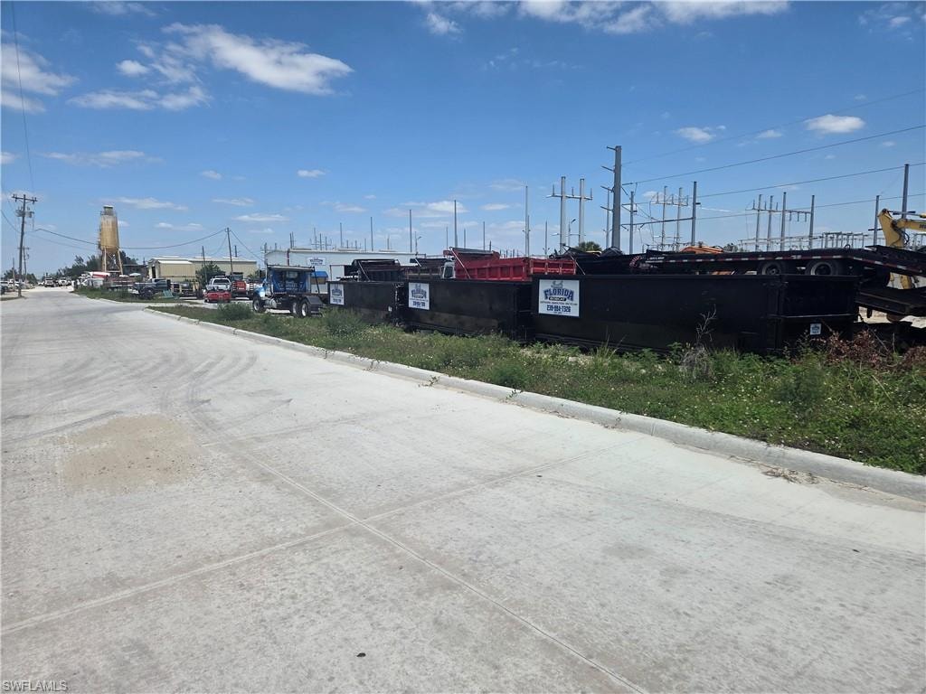 LOOKING NORTH ENTERANCE DRIVE, SITE ON RIGHT