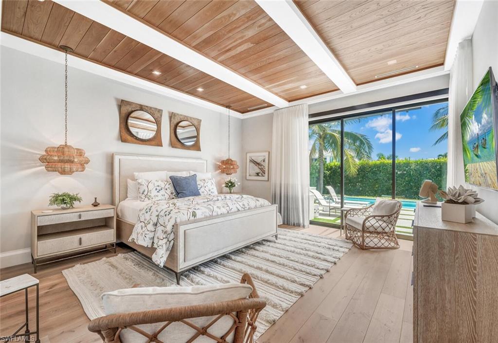 Primary Bedroom/King-Sized Bed