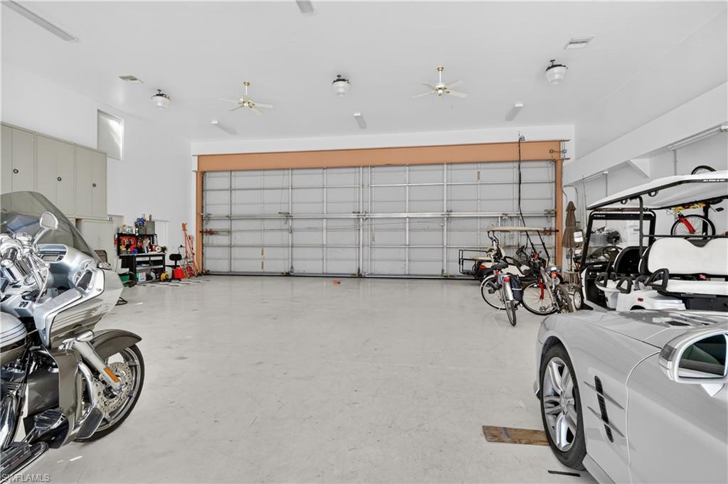 Garage featuring a ceiling fan