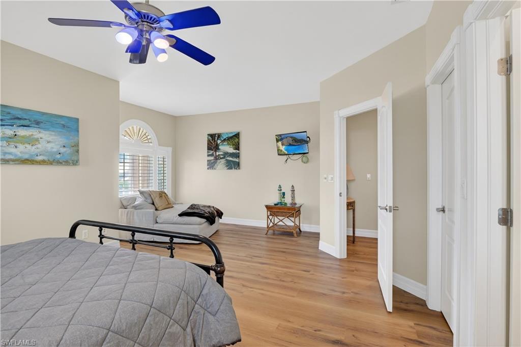 Bedroom featuring light wood finished floors and ceiling fan
