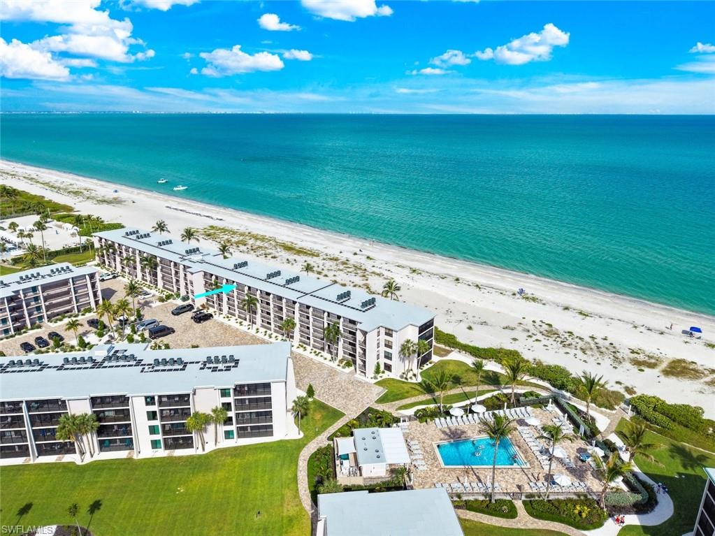 Beachfront residential complex featuring multiple buildings