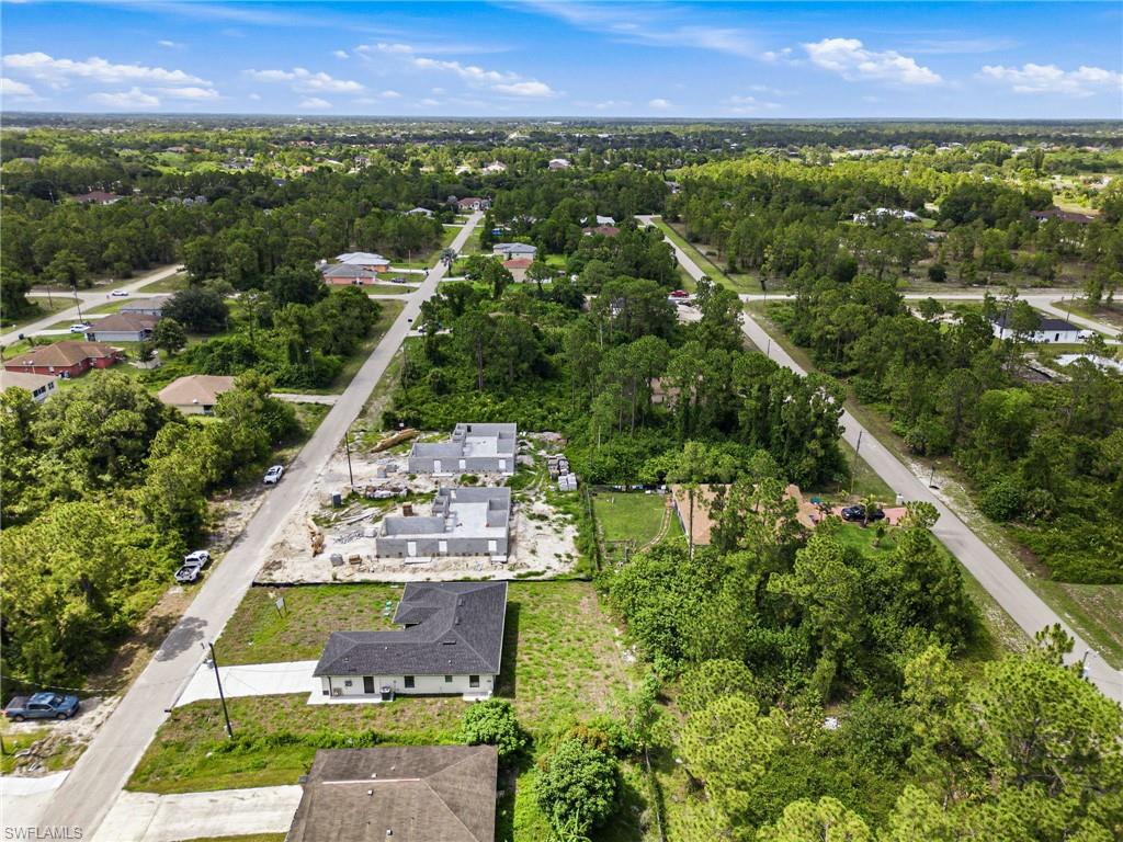 Aerial perspective showcasing multiple properties