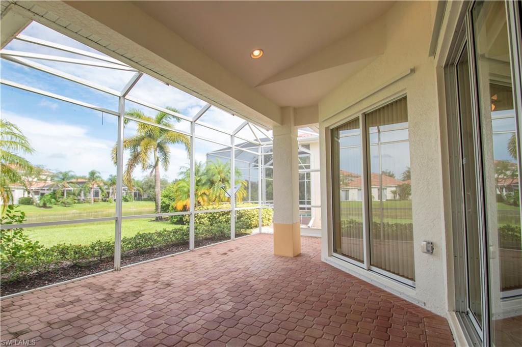 Unfurnished sunroom featuring a wealth of natural light