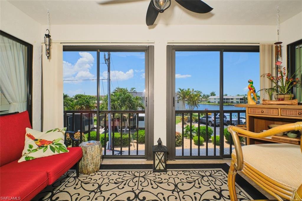 Lanai as we call it in Florida!  This lanai is enclosed with panels or the panels can be opened for fresh air.