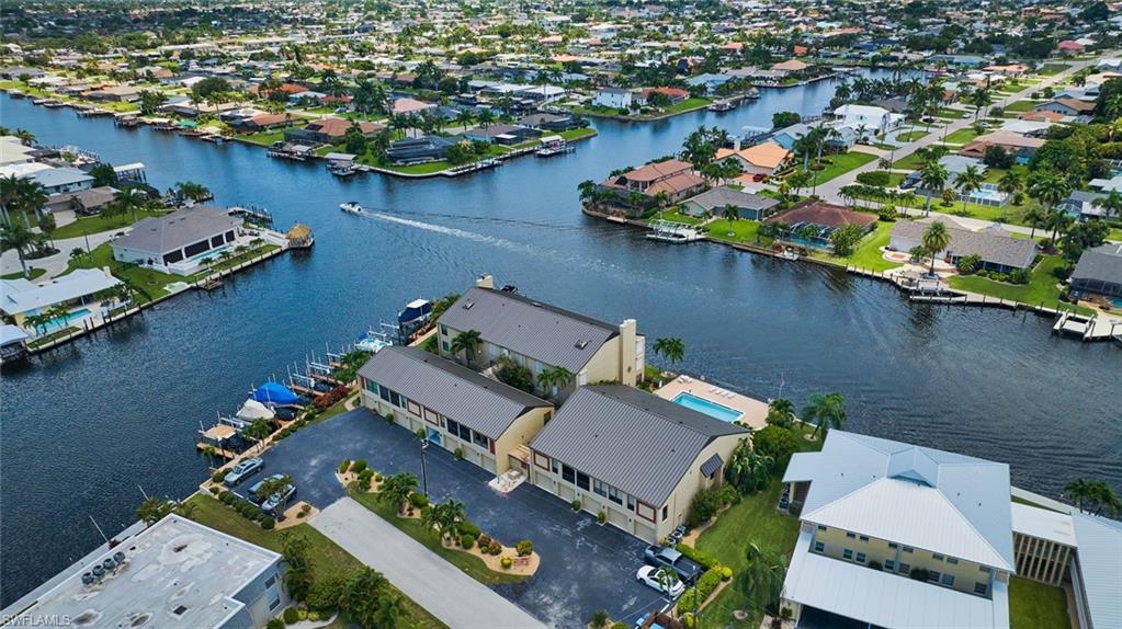 Aerial View showing the intersecting canals.  While sitting on your lanai you can watch boats going by all day long!  Incredible sunrises and sunsets daily!