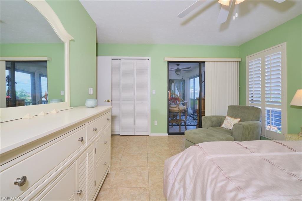 Another view of the Main bedroom showing double sliders to the lanai.  Plenty of room in the closet.