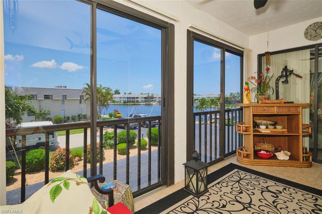 Sun room or lanai.  Pretty place to relax and watch the boats go by.