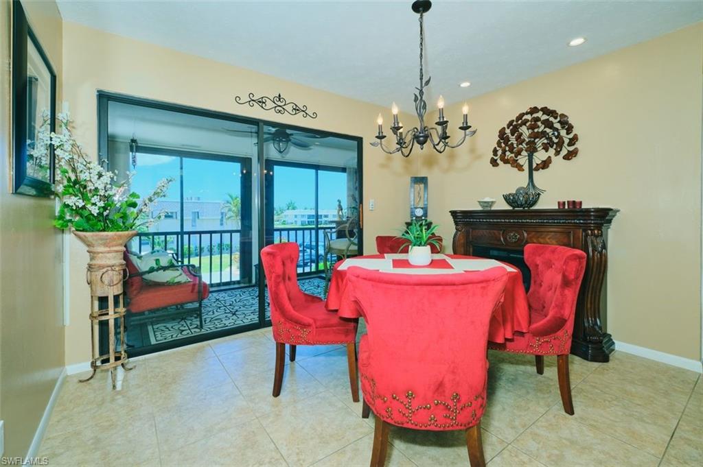 Nice cute dining room for 4.  Can put a table for 6 if you like.  Electric fireplace adds charm to this room.  Open up the lanai doors and enjoy the fresh Florida air!