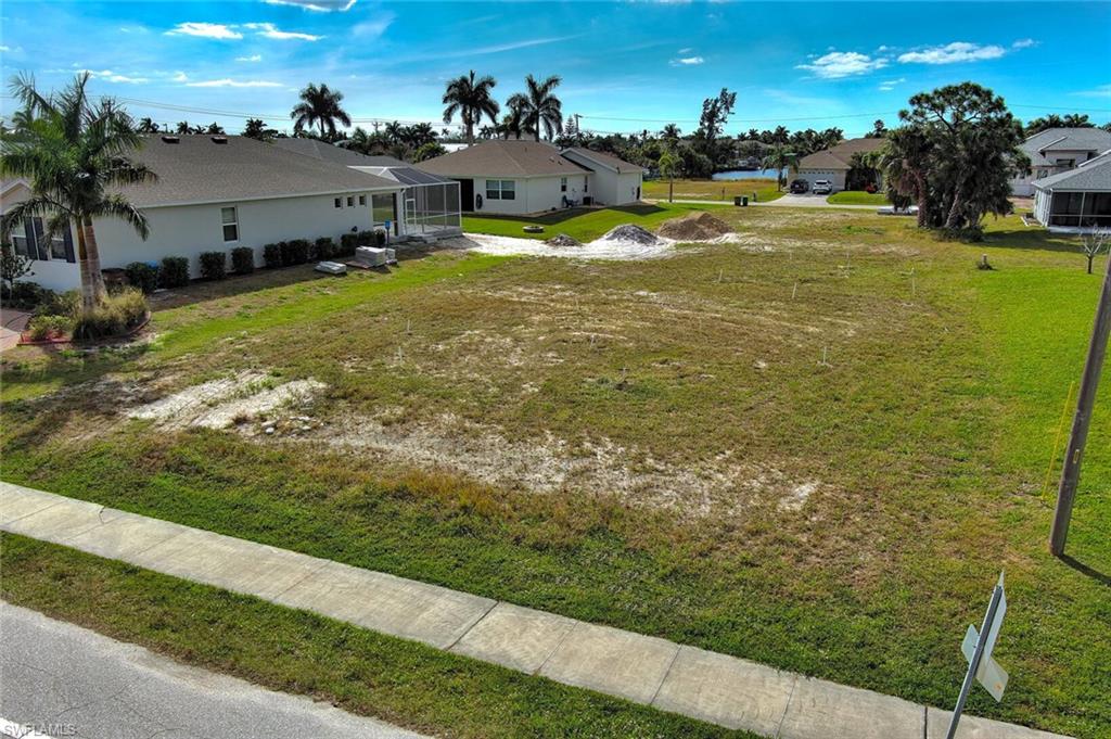 View of yard featuring a lanai