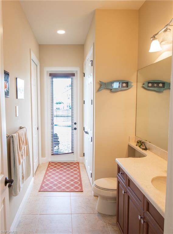Neutral tile flooring throughout