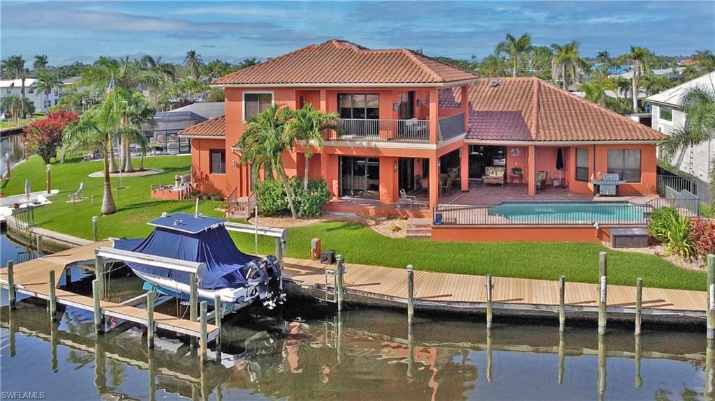 Waterfront residence with a private boat dock and lift