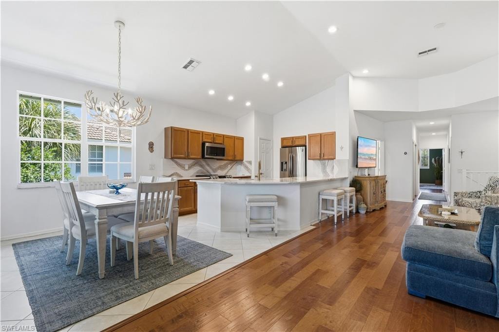 The living, dining, and kitchen areas flow together seamlessly.