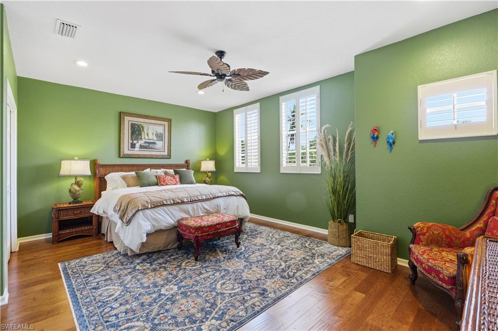 Large guest bedroom privately situated on the opposite side of the home from the primary bedroom.