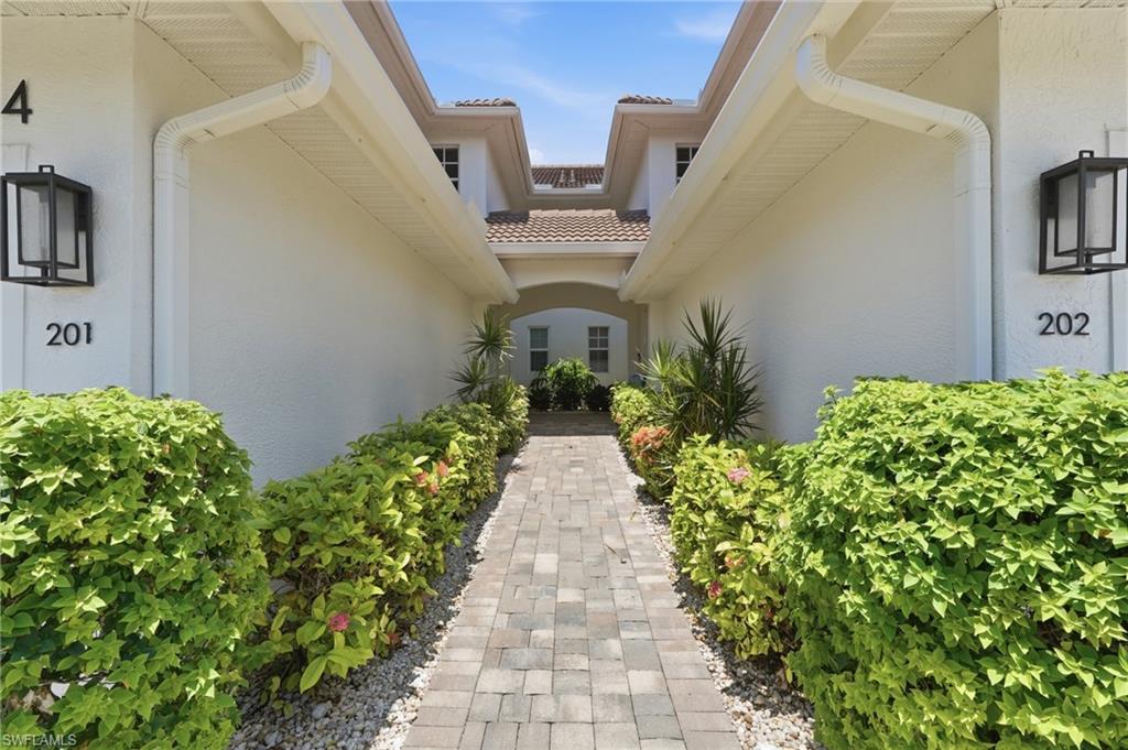 Beautifully landscaped walkway maintained by the association.