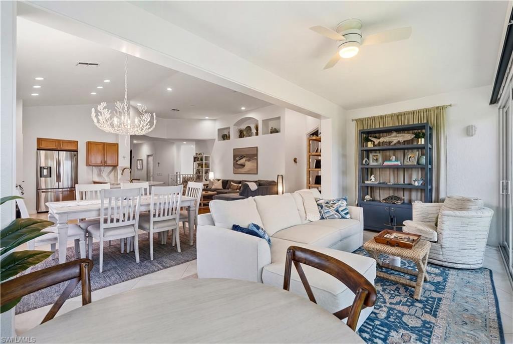 Effortless flow from the kitchen to the dining and living spaces.