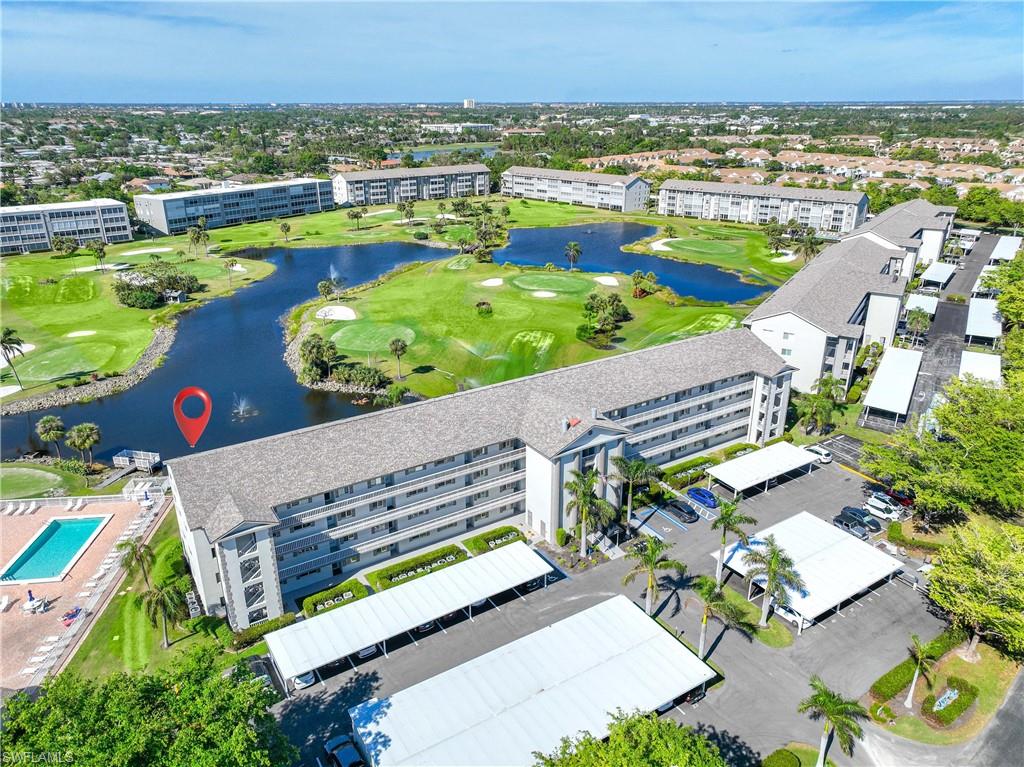 Bird's eye view of a local golf course and a large body of water