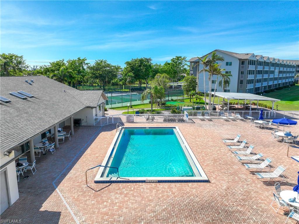 Community pool with a patio area