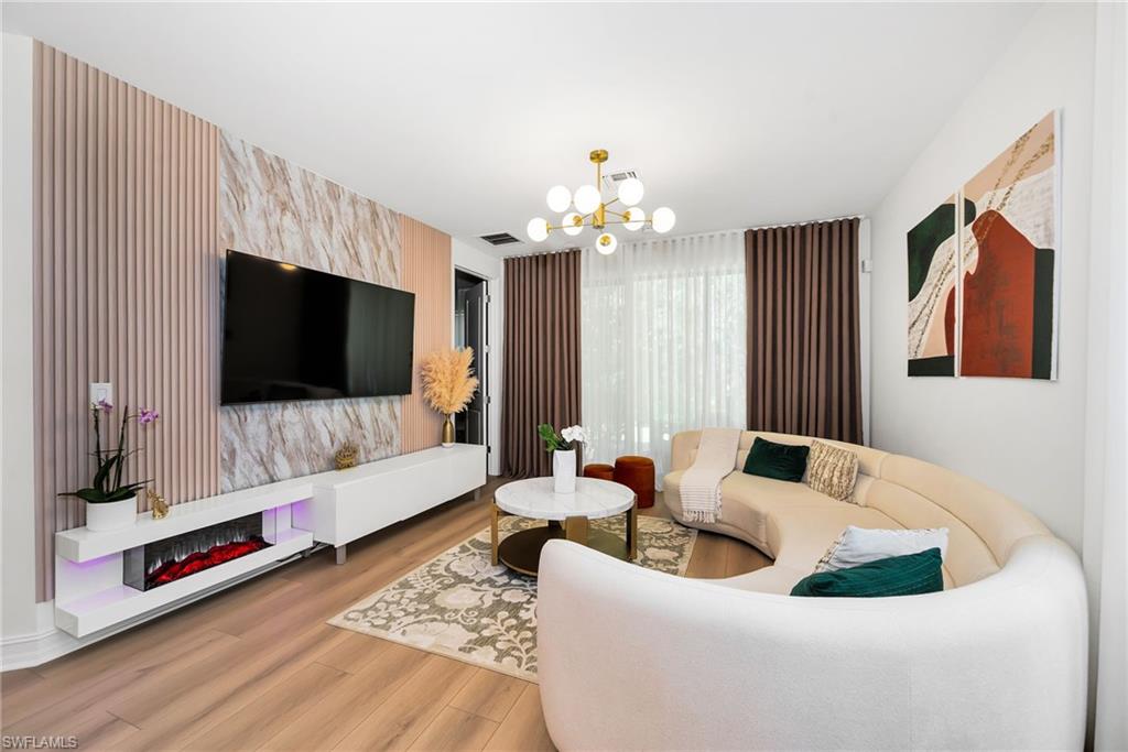 Accent wall featuring vertical paneling and a large-format slab-style panel