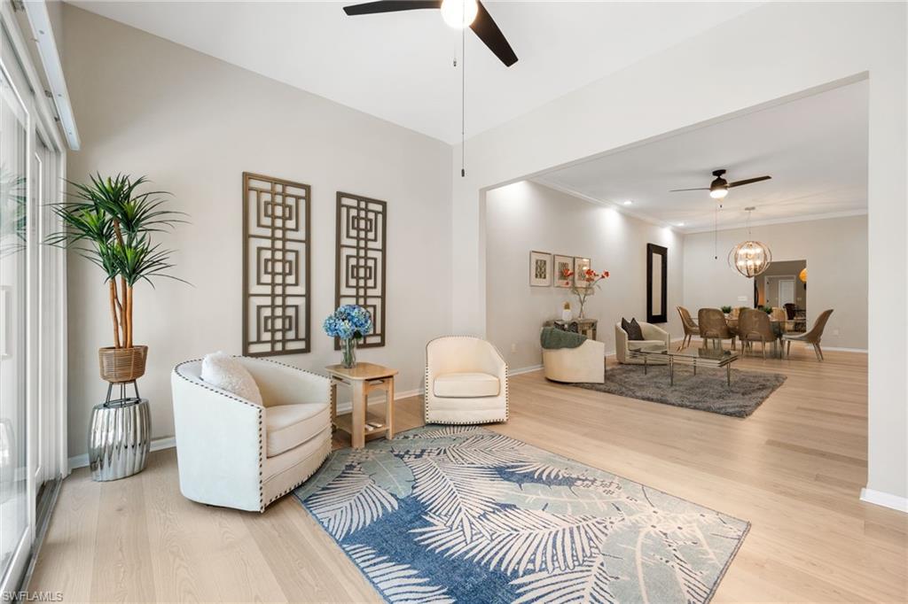This is bonus space - can set up a game room, music room, quiet sitting space. Filled with natural light with the new hurricane impact sliding glass doors.