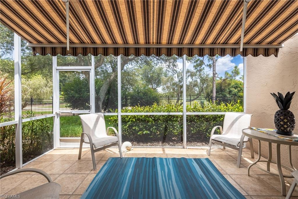 Screened Lanai has an electric awning to give you added shade and year round use of this bonus space.