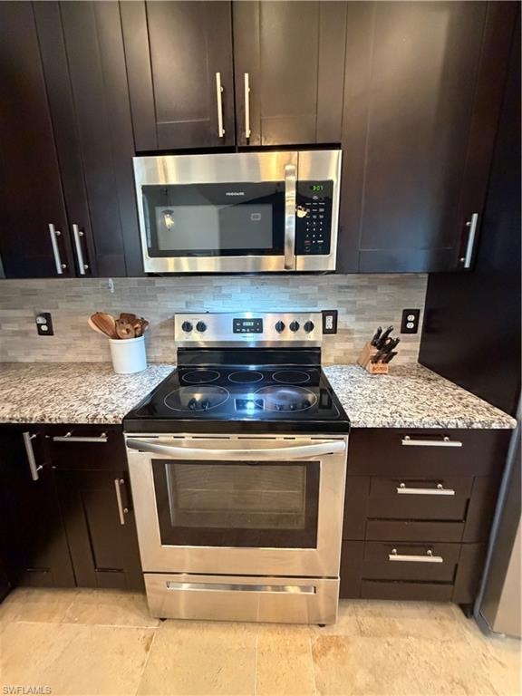 Stainless steel electric range with over-the-range microwave