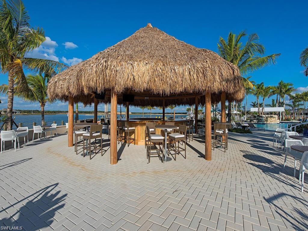 View of patio / terrace with a water view