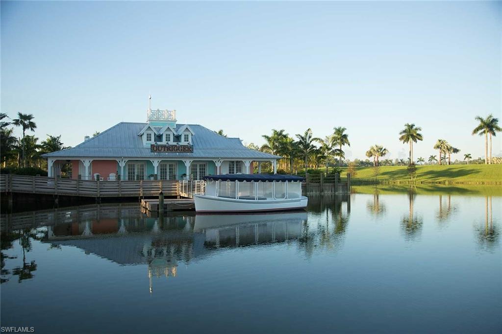 Rear view of property with a water view
