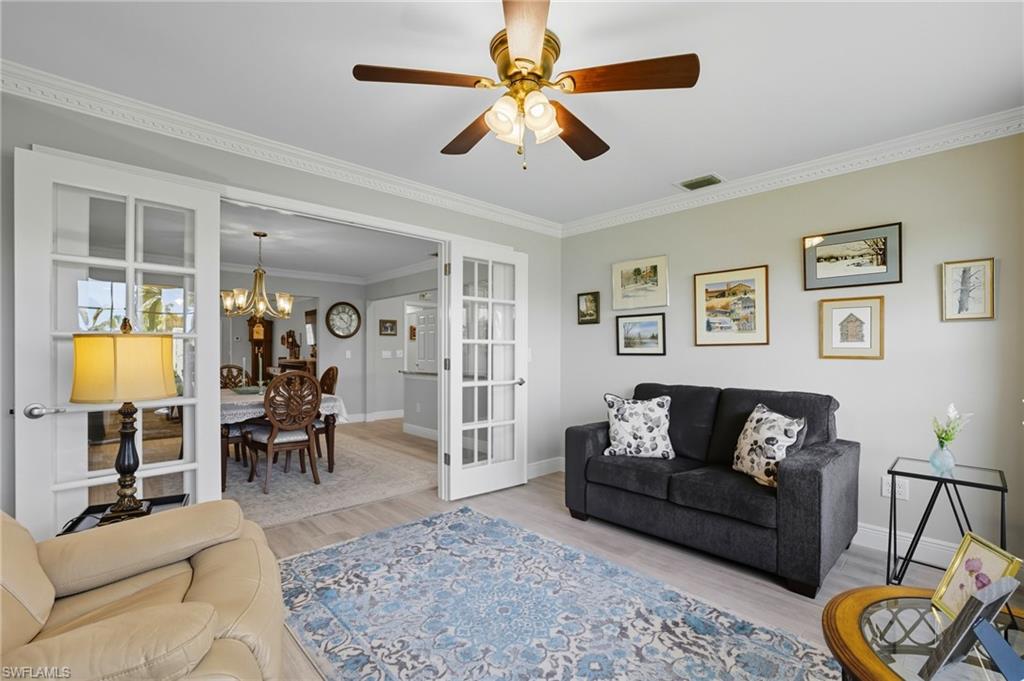 French doors open to a formal dining space