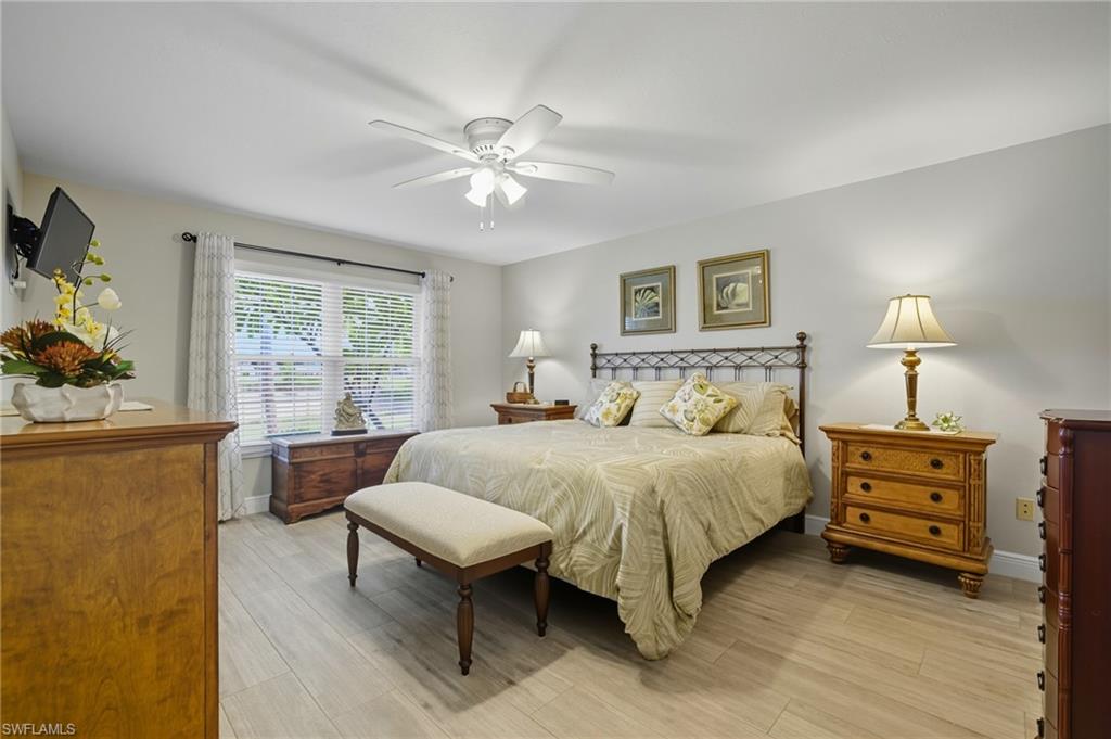 Neutral wall paint complemented by light wood-finish flooring