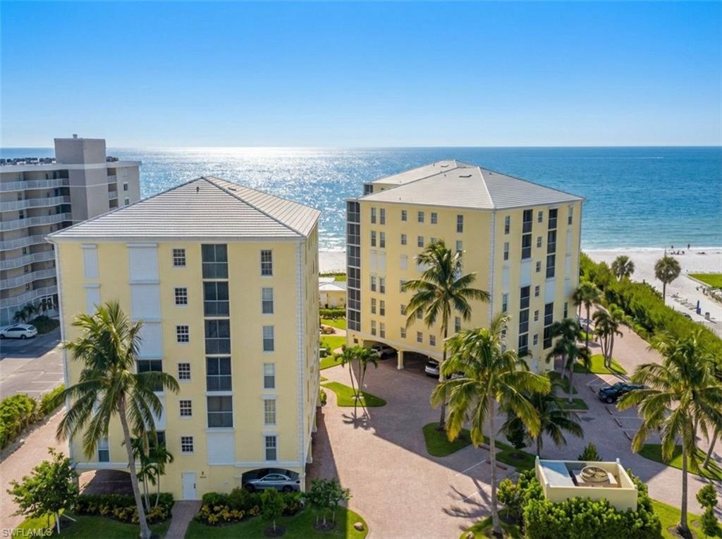 View of apartment building / complex with a water view