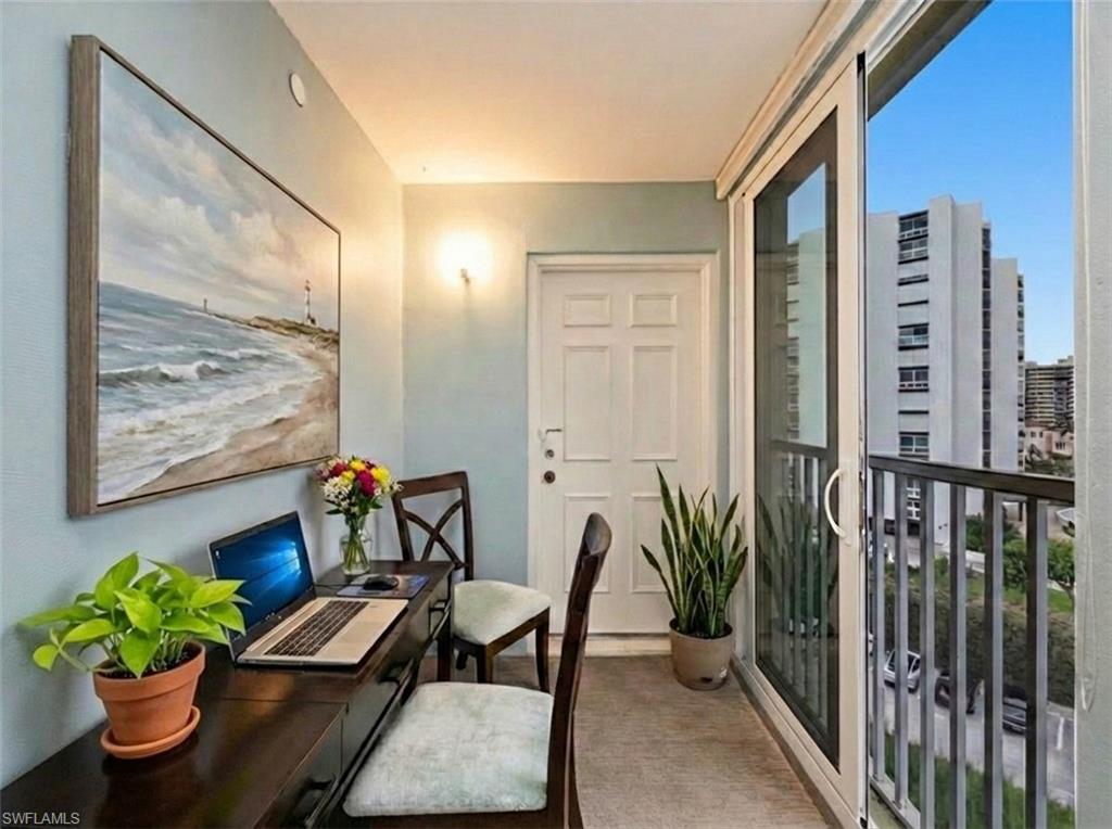 Office with light colored carpet