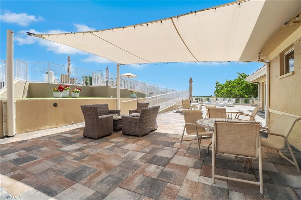 View of patio with outdoor dining space